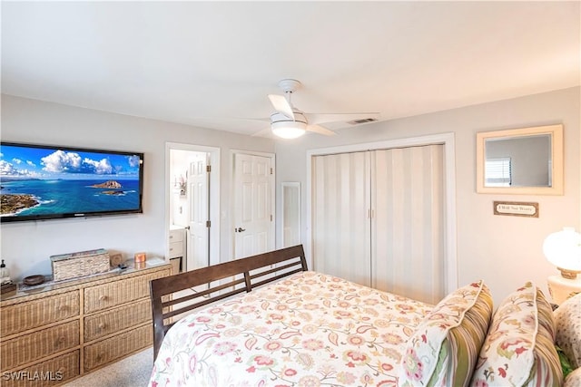 bedroom featuring ensuite bathroom, ceiling fan, and carpet flooring