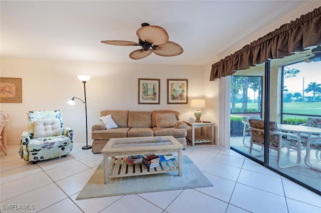 living room featuring light tile patterned floors and ceiling fan