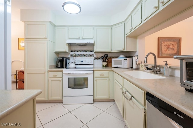 kitchen featuring backsplash, white appliances, sink, and light tile patterned floors