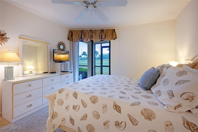 carpeted bedroom with access to exterior and ceiling fan