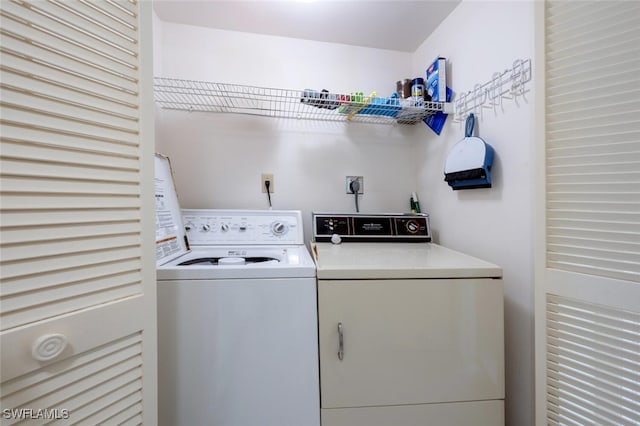 laundry area with washer and dryer