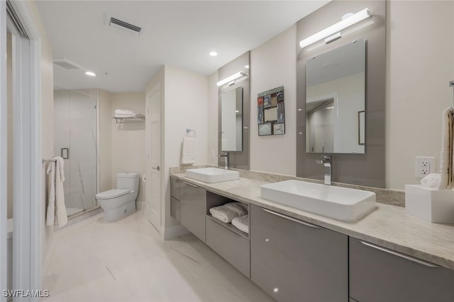 full bath with a stall shower, visible vents, a sink, and toilet