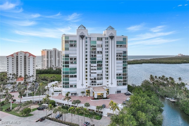 view of building exterior with a water view