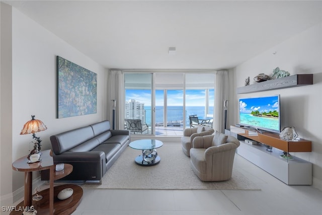 living area with floor to ceiling windows