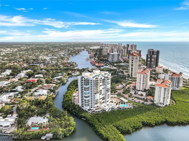 drone / aerial view featuring a water view and a city view