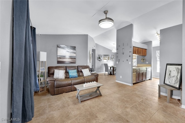 tiled living room with lofted ceiling