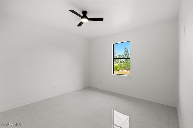 spare room featuring ceiling fan