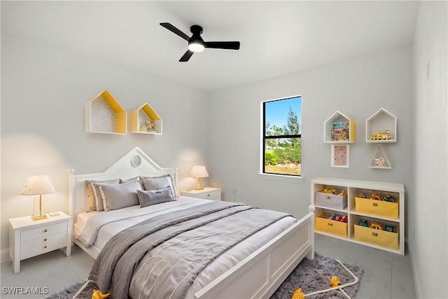 bedroom with light tile patterned floors and ceiling fan