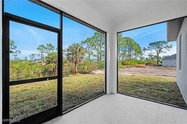 unfurnished sunroom with a wealth of natural light