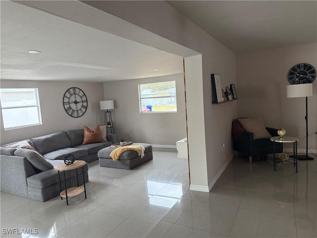 living room with light tile patterned floors