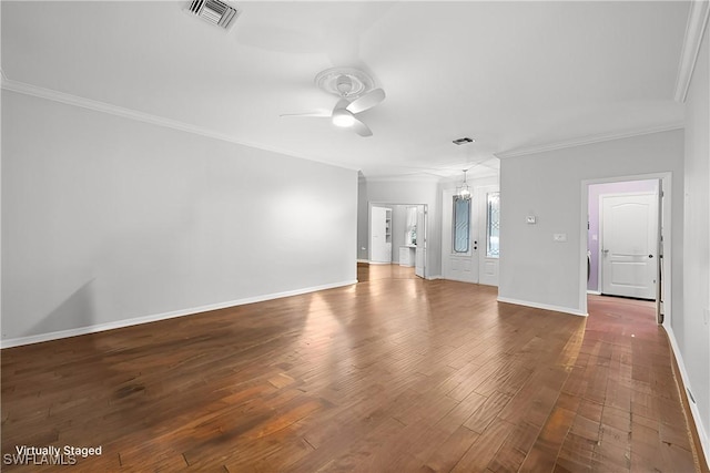 spare room with ceiling fan, dark hardwood / wood-style flooring, and ornamental molding