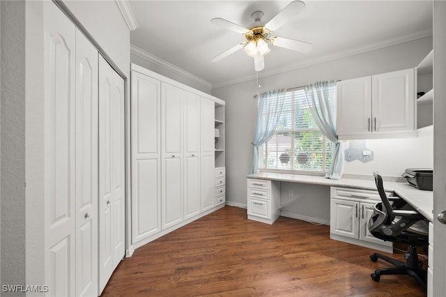 office area with ceiling fan, dark wood-type flooring, and crown molding