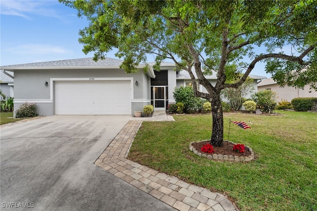 single story home with a front yard and a garage