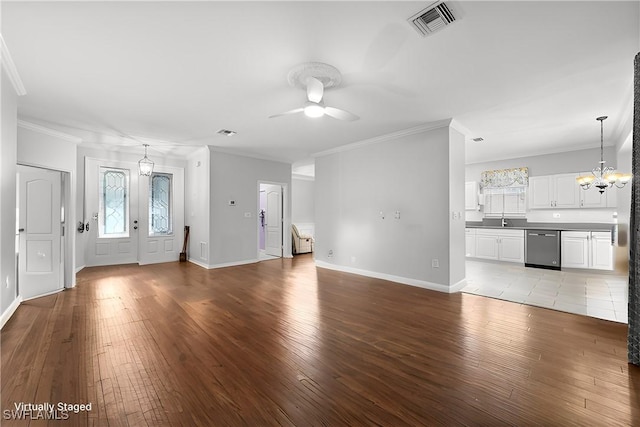 unfurnished living room featuring ceiling fan with notable chandelier, sink, light hardwood / wood-style flooring, and crown molding