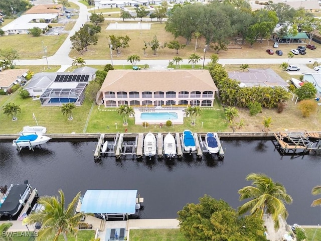 drone / aerial view with a water view