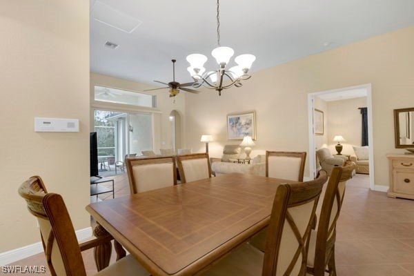 dining space with a chandelier