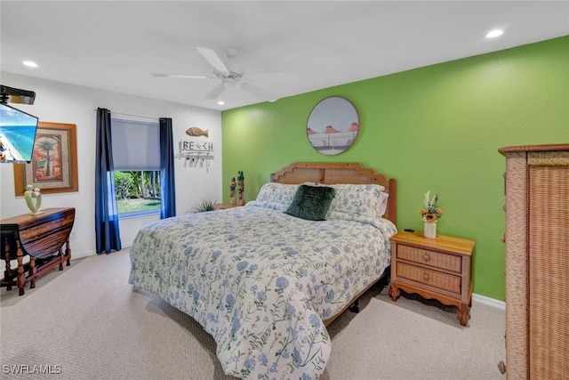 carpeted bedroom featuring ceiling fan