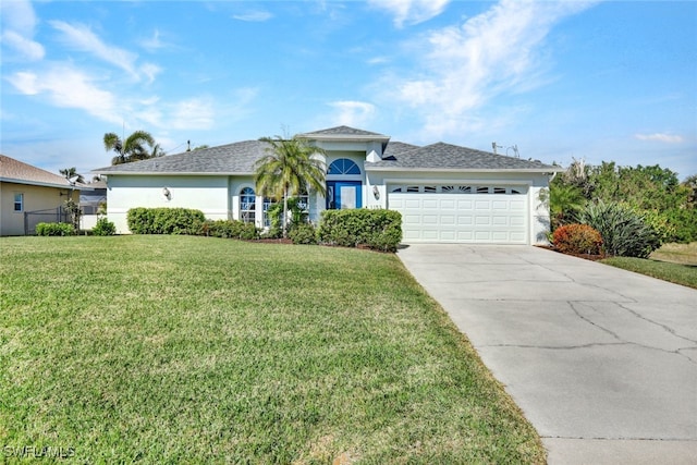 ranch-style home featuring a garage and a front lawn