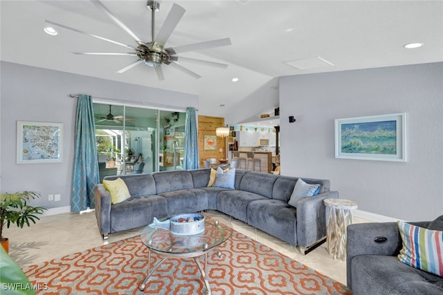 living room featuring light tile patterned floors, vaulted ceiling, and ceiling fan