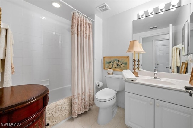 full bathroom with vanity, tile patterned floors, shower / bath combo with shower curtain, and toilet