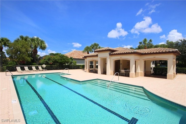 view of pool with a patio