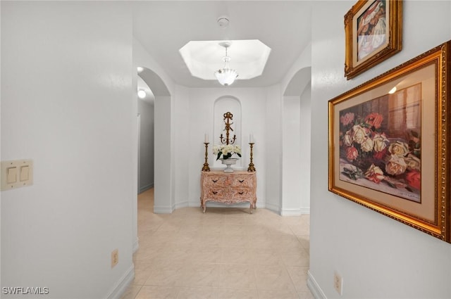 hallway featuring light tile patterned flooring