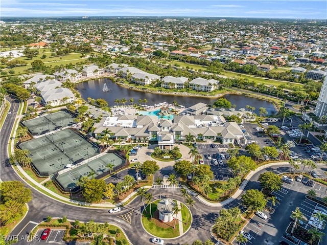 birds eye view of property with a residential view and a water view