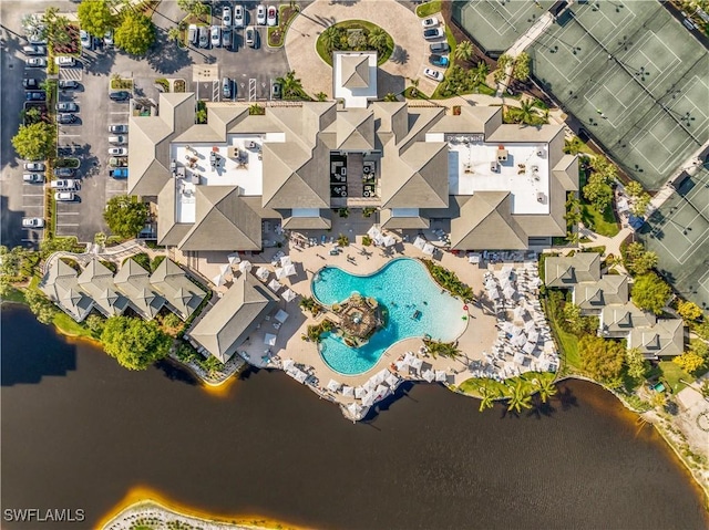 bird's eye view with a water view