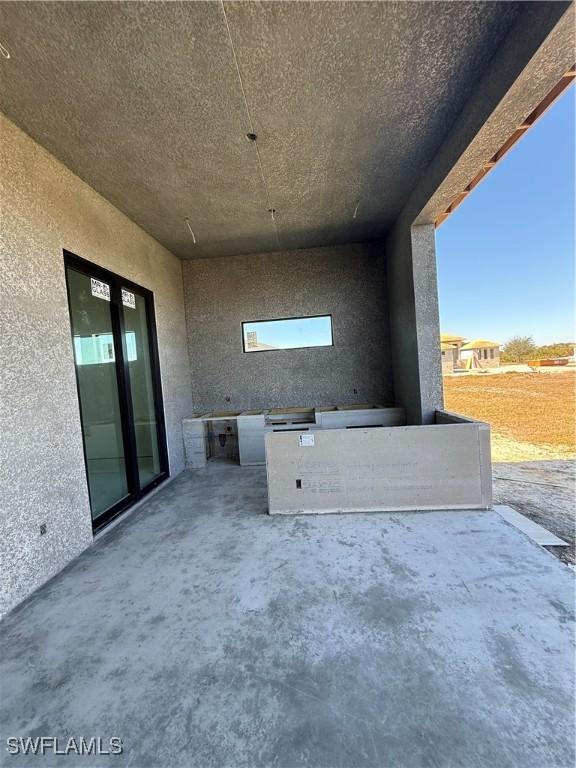 view of patio / terrace with exterior kitchen