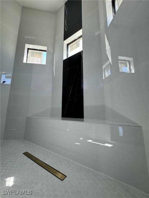 bathroom with tile patterned floors