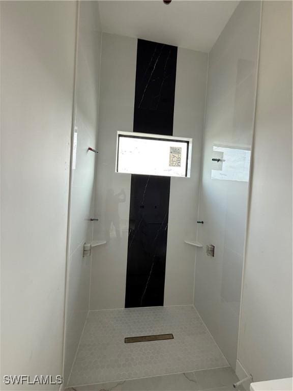 bathroom featuring walk in shower