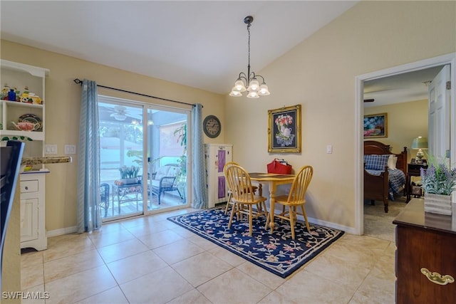 dining space with light tile patterned flooring, vaulted ceiling, and a notable chandelier