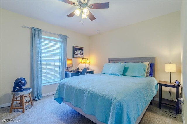 bedroom featuring light carpet and ceiling fan