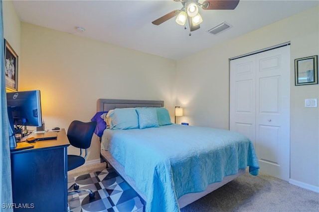 bedroom featuring ceiling fan and a closet