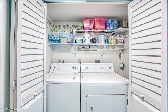 laundry area featuring laundry area and washer and clothes dryer