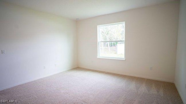 empty room with carpet floors