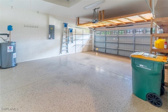 garage featuring a garage door opener, electric panel, and electric water heater