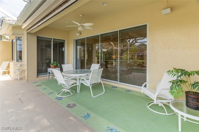 view of patio with ceiling fan