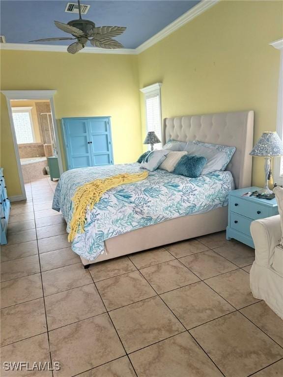 bedroom with connected bathroom, crown molding, light tile patterned floors, ceiling fan, and multiple windows