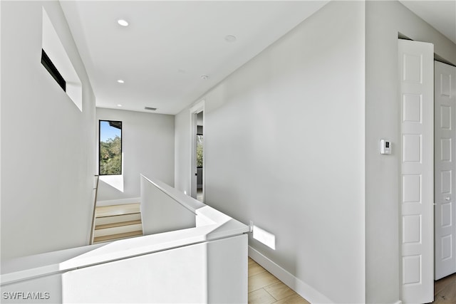 corridor featuring light hardwood / wood-style flooring