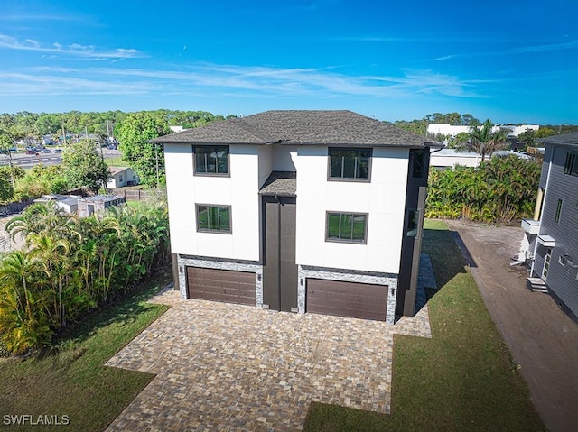 view of front of home with a garage