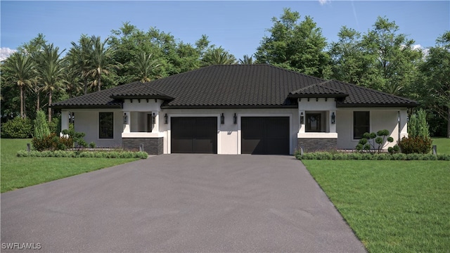 mediterranean / spanish-style house featuring a garage and a front lawn