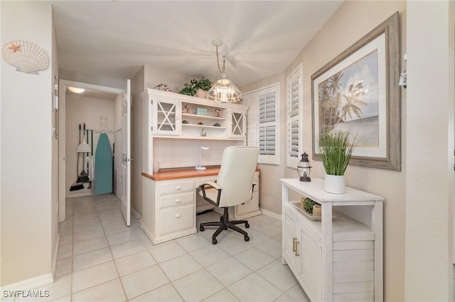 home office featuring light tile patterned floors