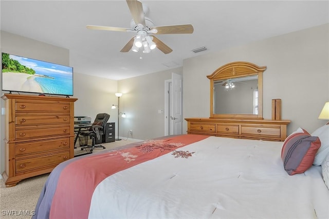 bedroom with light carpet and ceiling fan