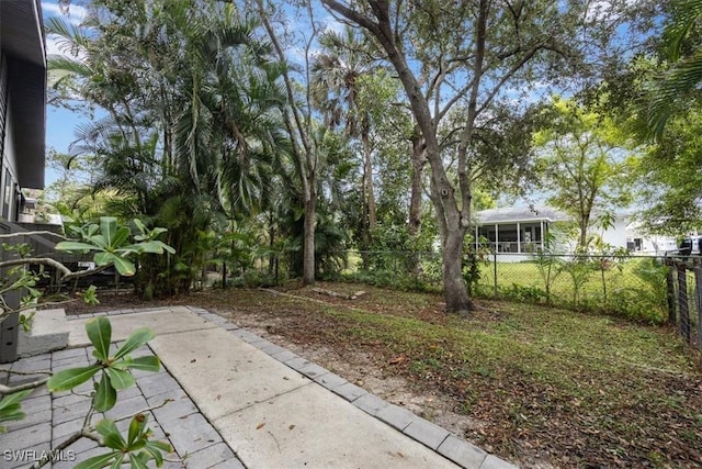 view of yard featuring a fenced backyard and a patio