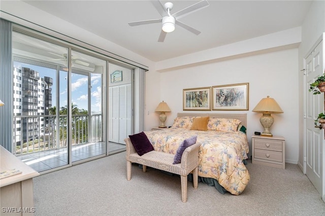 carpeted bedroom with access to exterior and ceiling fan