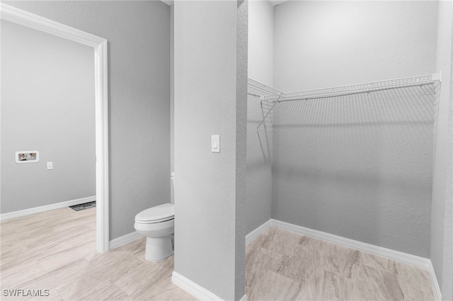 interior space featuring toilet