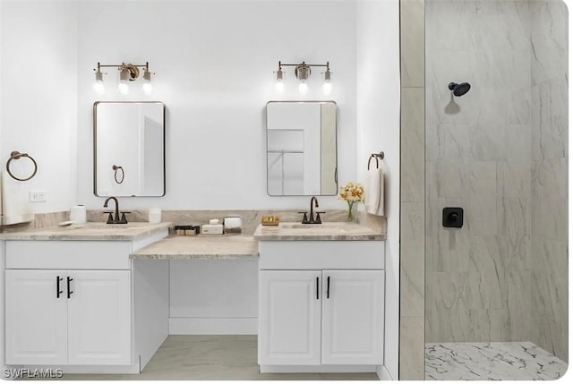 27141 Alhambra Dr, Punta Gorda, FL 33955 - bathroom with double vanity, a marble finish shower, and marble finish floors