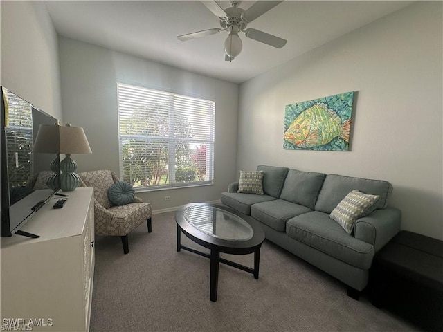 carpeted living room featuring ceiling fan