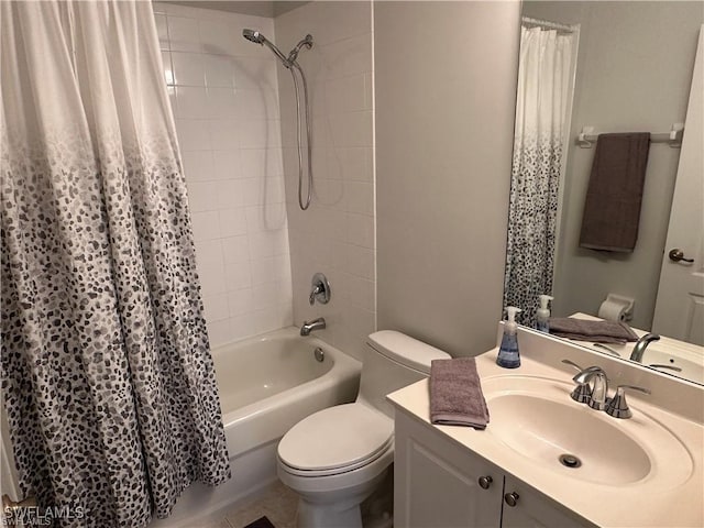 full bathroom featuring shower / bath combination with curtain, vanity, and toilet